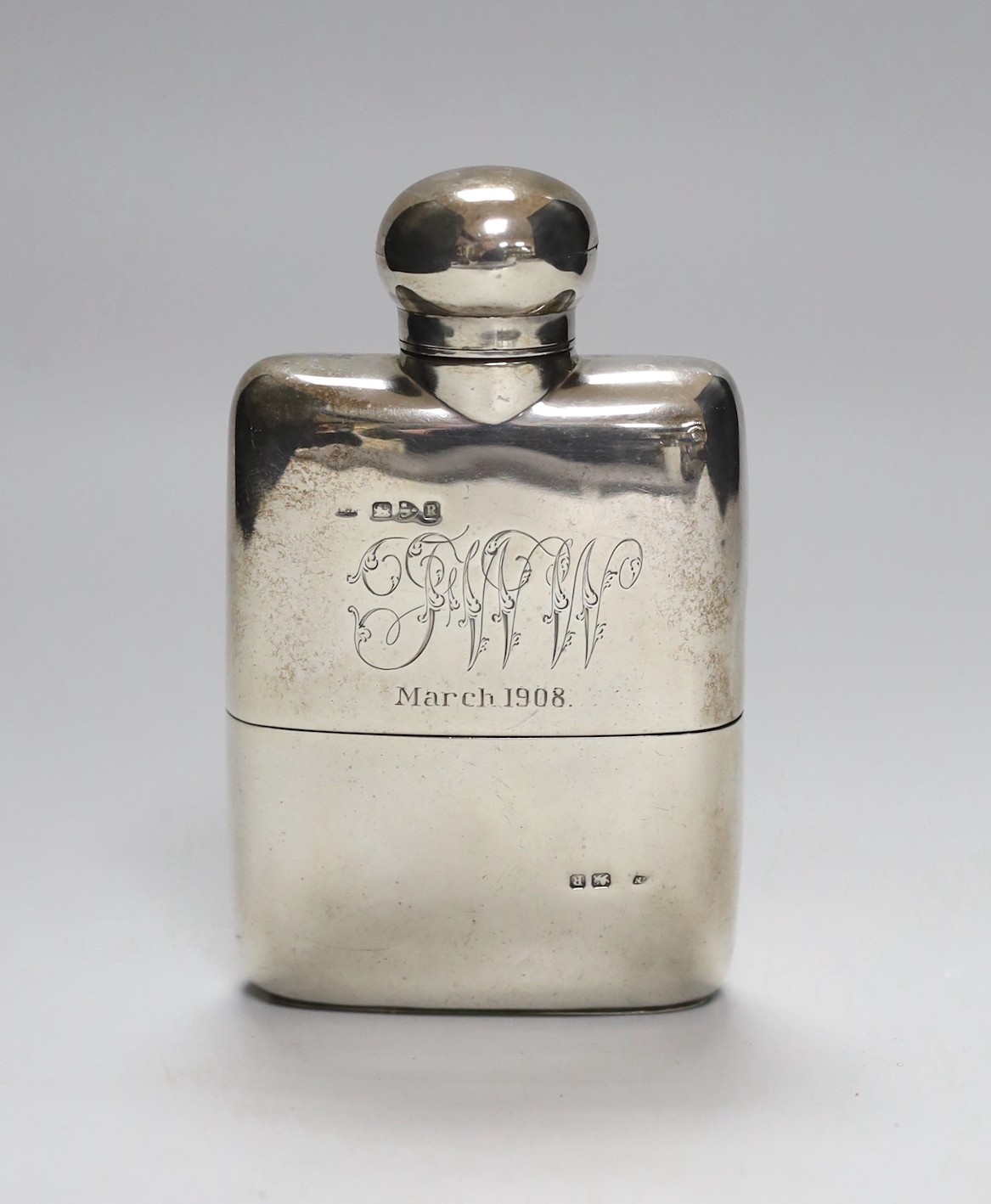 A late Victorian silver hip flask, engraved with later date and initials, William Neale & Sons, Chester, 1900, 12.1cm, gross 5.4oz.